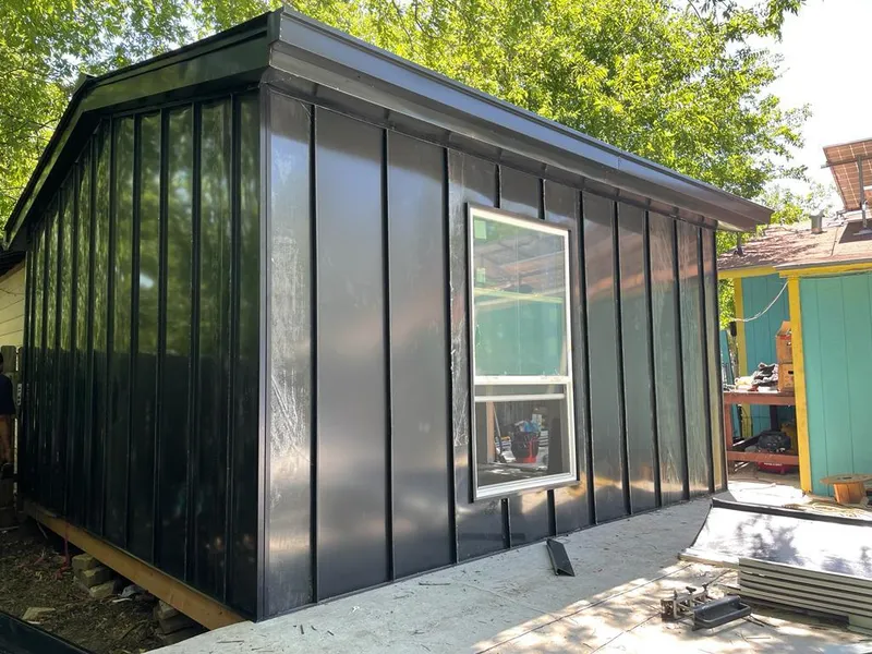 Black standing seam metal wall panels for Roof Inspection in Barstow